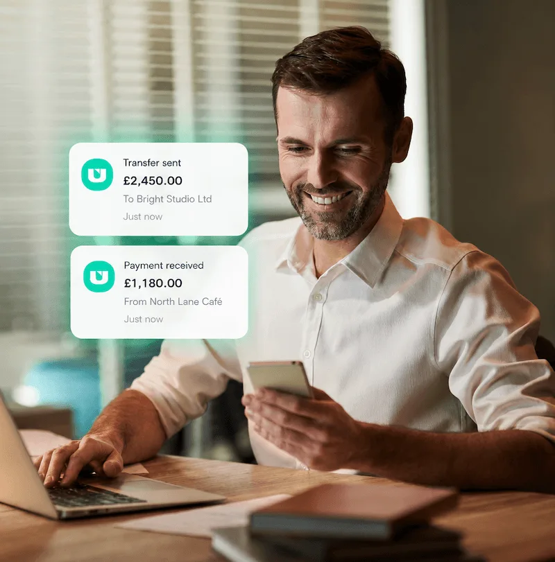 Business owner reviewing RUUT transfer and incoming payment notifications